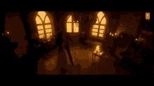 a man and a woman are kissing in a dark room in front of a window .