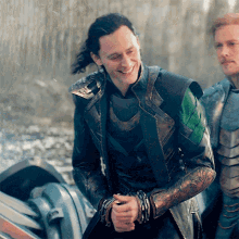 Marvel Loki GIF - Marvel Loki Laugh GIFs