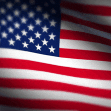 a blurry picture of an american flag with white stars