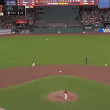 a baseball field with a scoreboard that says $ 31,120 in the background