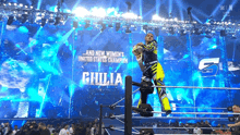 giulia is the new women 's united states champion in a wrestling ring .