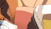 a close up of a person 's leg with a blue stripe on the knee