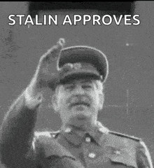a man in a military uniform giving a salute with the words stalin approves below him