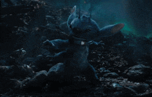 a ghostly figure is standing in a dark cave