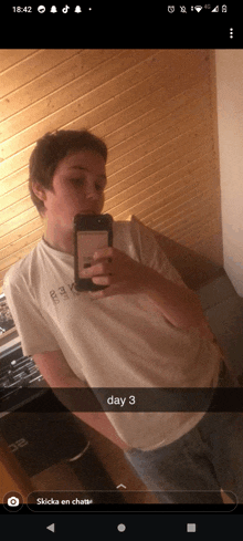 a young man taking a selfie with the words day 3 on the bottom right