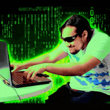 a man wearing sunglasses is typing on a laptop in front of a binary background