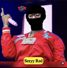 a man wearing a red jacket and a black mask is holding a pink microphone with the words sexyy red below him