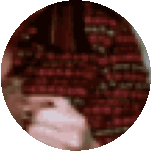 a blurred image of a person 's face in a circle .