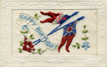 a happy birthday card with flags and flowers on it