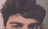 a close up of a person 's face with their eyes closed .
