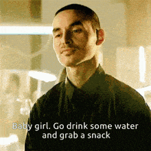 a man in a black shirt says baby girl go drink some water and grab a snack ..