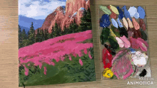 a painting of a field of pink flowers next to a paint palette