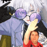 a man wearing sunglasses and a shirt that says ' ho ' on it stands next to a cartoon character