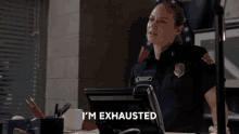 a woman in a firefighter uniform says she is exhausted