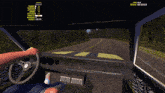 a computer screen shows a car driving down a road with a speed of 14.8 km / h