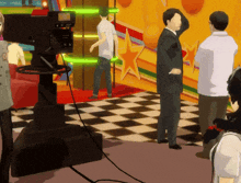 a man in a suit stands in front of a camera in a room with a checkered floor