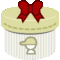a striped box with a baseball cap and a red bow on top .