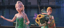 elsa and anna from frozen are standing next to each other holding flowers