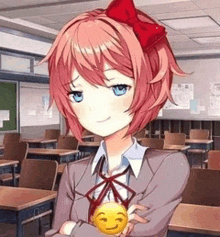 a girl is standing in a classroom with her arms crossed and holding a smiley face .