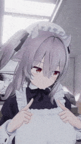 a girl in a maid outfit is giving a thumbs up sign