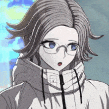 a close up of a girl wearing glasses and a hoodie .