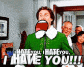 a man in a green jacket says " i hate you " in front of a group of people