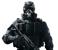 a man wearing a gas mask and goggles is holding a rifle