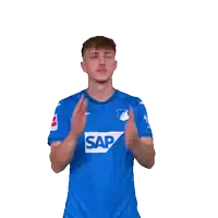 a man wearing a blue shirt with the word sap on the front