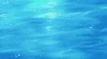 a cartoon of a shark swimming in the water with the letters bbc visible
