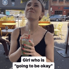 a woman is drinking a green drink with a straw and the words girl who is " going to be okay " on the bottom