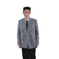 a man in a suit and tie spreads his arms out