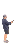 a man in a blue hoodie and shorts is holding a gun