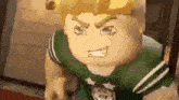 a close up of a cartoon character with a crown on his head and a green shirt .