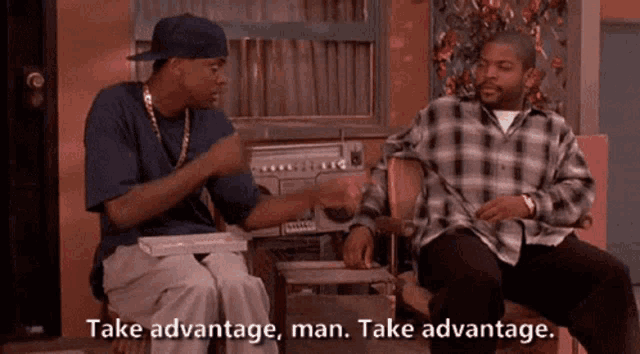 two men are sitting on a porch and one of them is saying take advantage