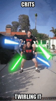 two men are twirling lightsabers with the words crits twirling it above them