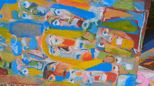 a close up of a colorful painting with a blue circle in the center