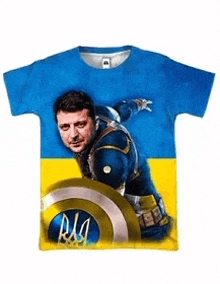 a t-shirt with a picture of a man in a superhero costume holding a shield .