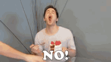 a blurry picture of a man being punched with the word no on the bottom