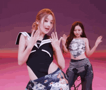 two women are dancing in front of a pink background that says rldp
