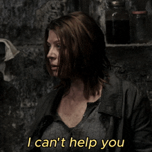 a woman says " i can 't help you " in a dark room