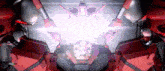 a red robot with a light coming out of it