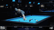 a pool table with a blue cloth says diamond on it