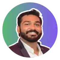 a man with a beard is smiling in a circle with a green and purple background