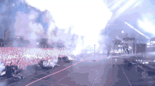 a crowd of people watching a concert with a sign that says ultra music festival on it