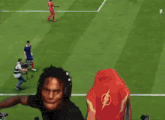 a man wearing headphones is playing a video game