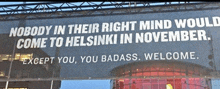 a billboard that says nobody in their right mind would come to helsinki in november