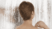 Shower Showering GIF - Shower Showering Mid Adult Woman GIFs