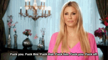 a woman in a pink dress is saying fuck you fuck this fuck that fuck him fuck you fuck off