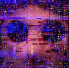 a blurry picture of a person 's face with a purple eye in the middle