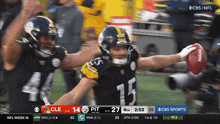 a cbs sports screen shows a football game between pittsburgh and cleveland
